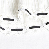 GABO ruffled midi dress in white