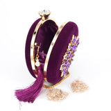 Purple gem round tasseled wrist clutch