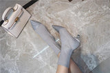 Sock boots with sequinned toe in gray